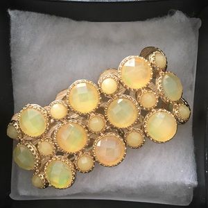 Wide bauble cuff bracelet. Stretchy Yellow and Gold tone